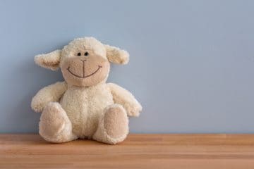 smiling sheep stuffed animal