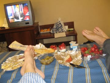 Room picnic on the bed in Spain - another way how to save money on food while traveling
