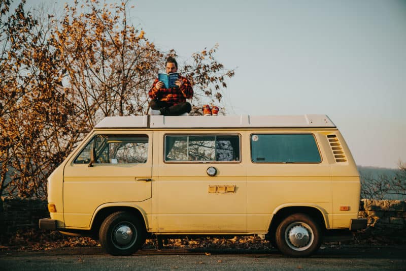 Grant Sabatier reading on VW bus